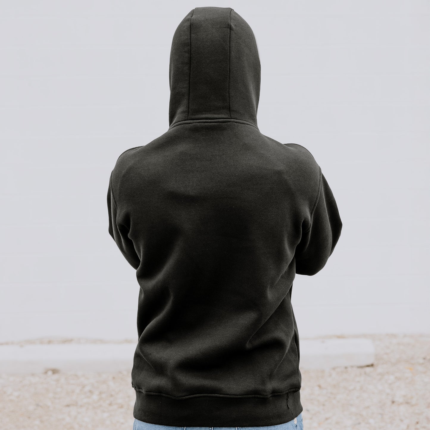 OOsmash men’s black hoodie with gray plug design back view, made from cotton-poly blend