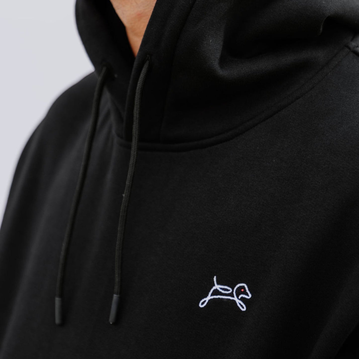 OOsmash men’s black hoodie with red plug design made from 80% cotton and 20% polyester.