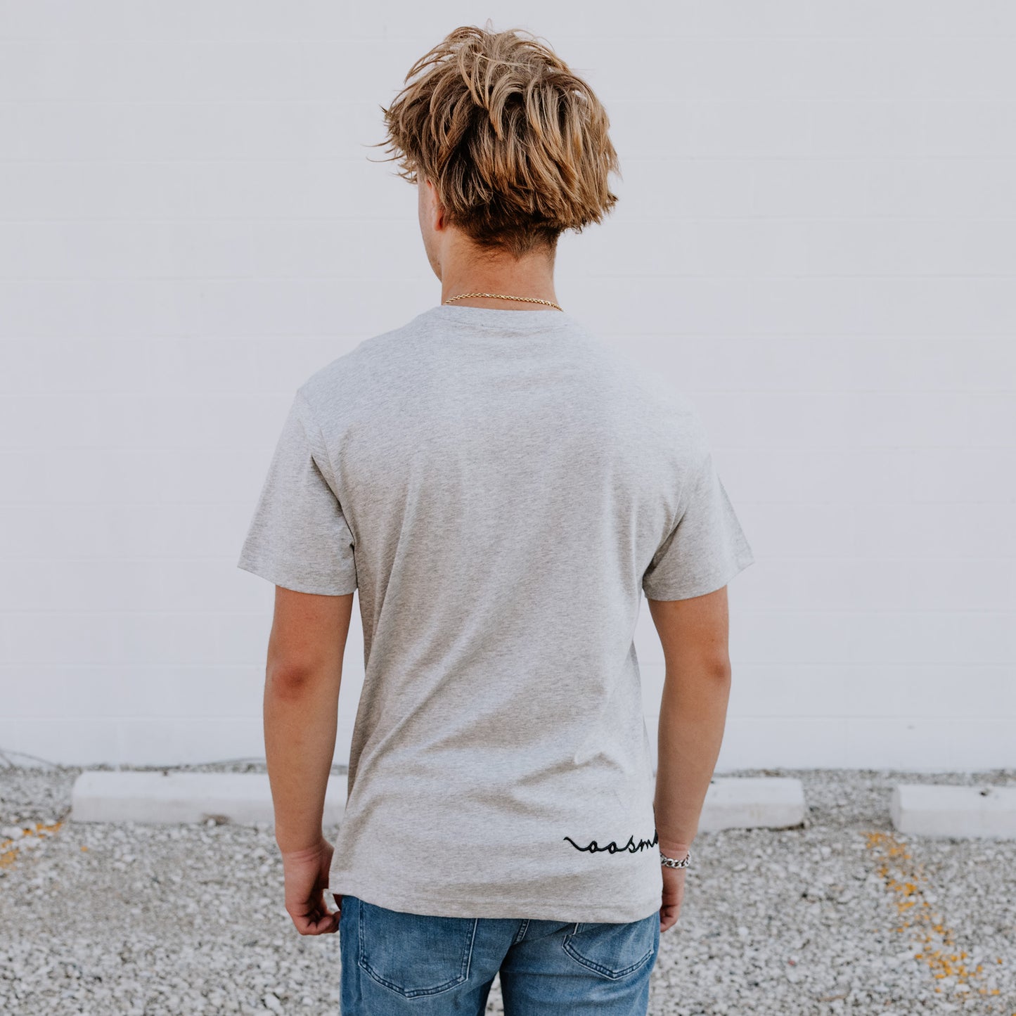 Back view of OOsmash men’s gray T-Shirt crafted from high-quality Supima cotton for comfort and durability.