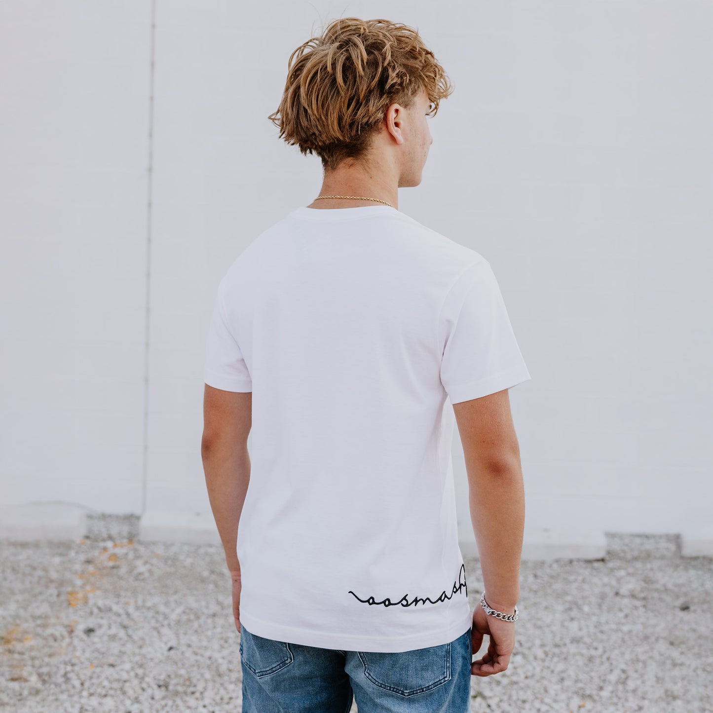 Front view of OOsmash men’s white T-Shirt crafted from high-quality Supima cotton for comfort and durability.