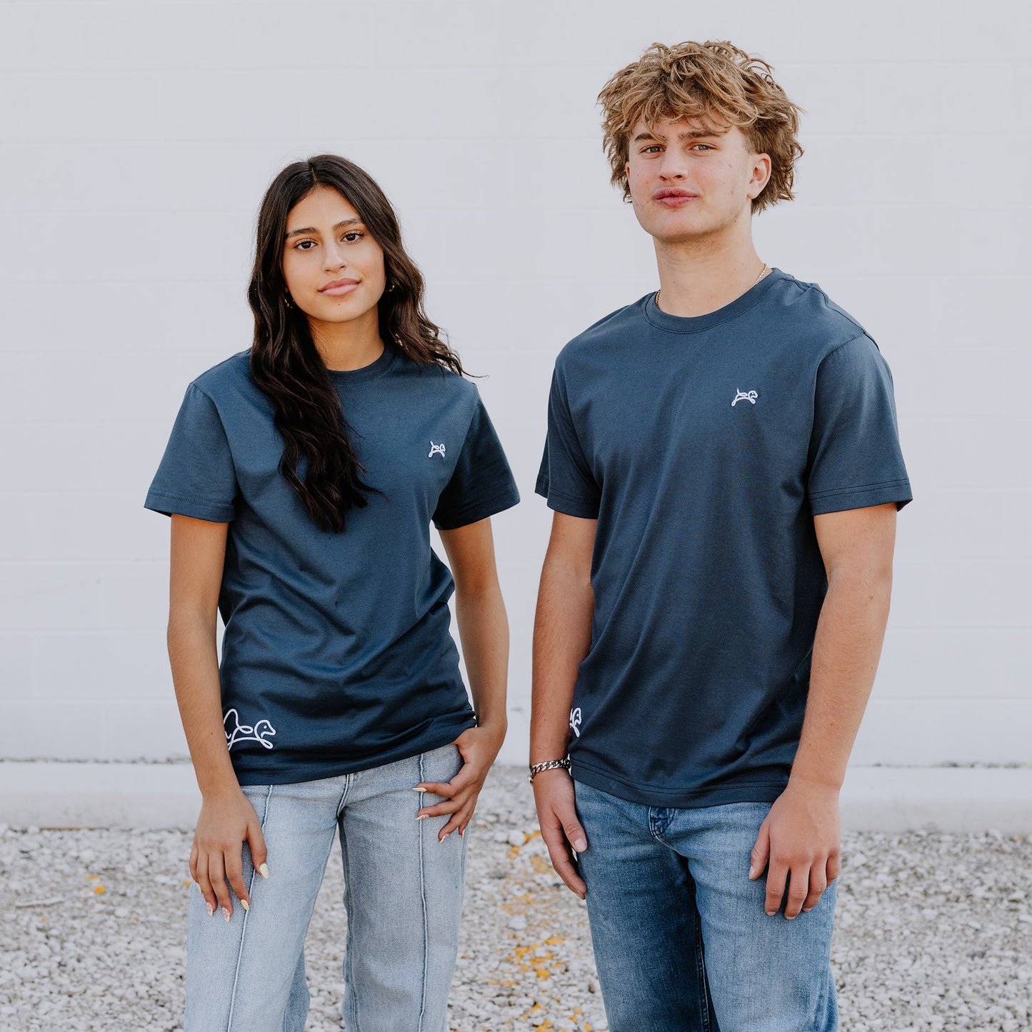 Models wearing OOsmash women’s navy blue T-Shirt featuring clean seams and comfortable fit.