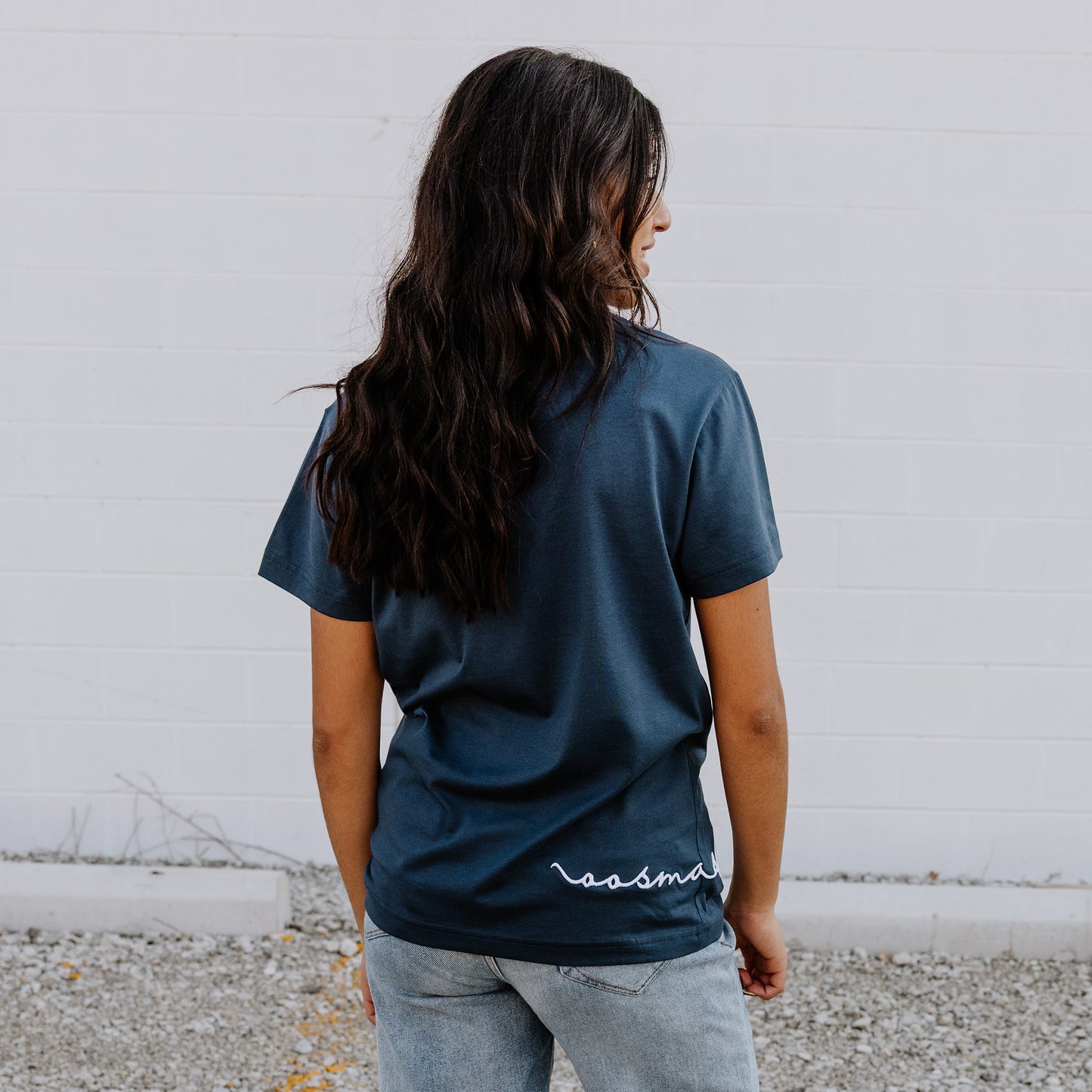 Model wearing OOsmash women’s navy blue T-Shirt featuring clean seams and comfortable fit.