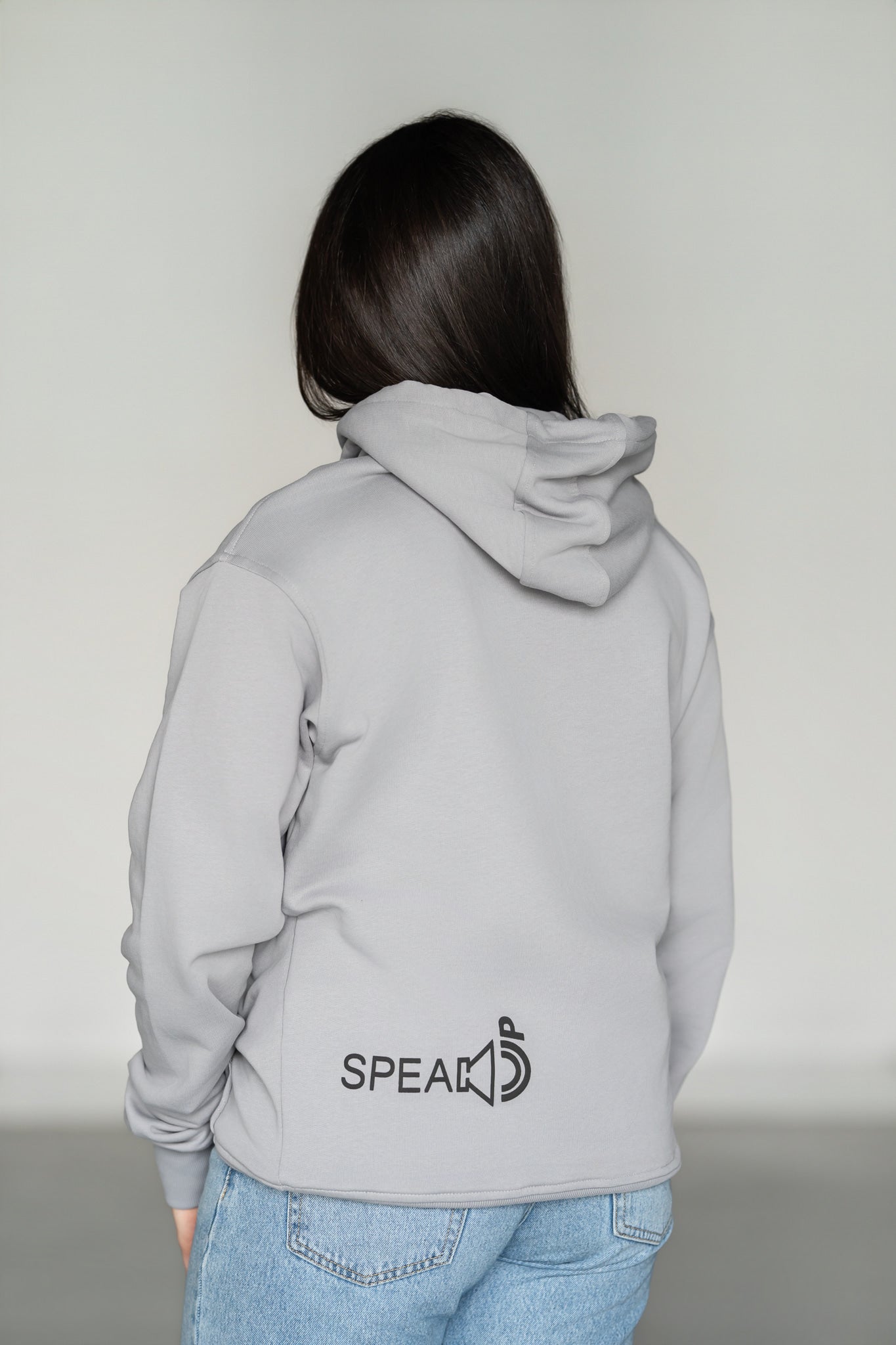 OOsmash Speak Up Hoodie — women's back view, bold Speak Up graphic print, buttery-soft French Terry Cotton, relaxed silhouette