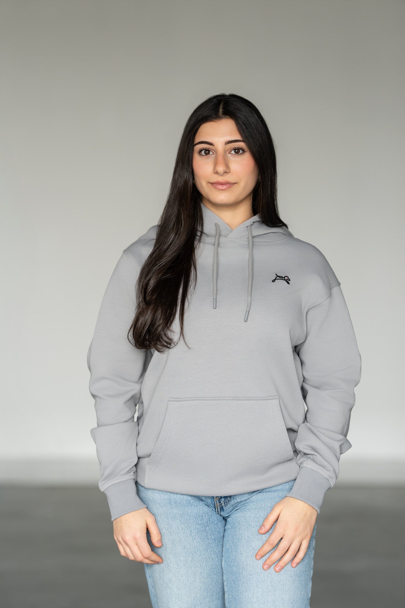 OOsmash Essential Hoodie front view — women's relaxed fit, soft cotton, drawstring hood, streetwear