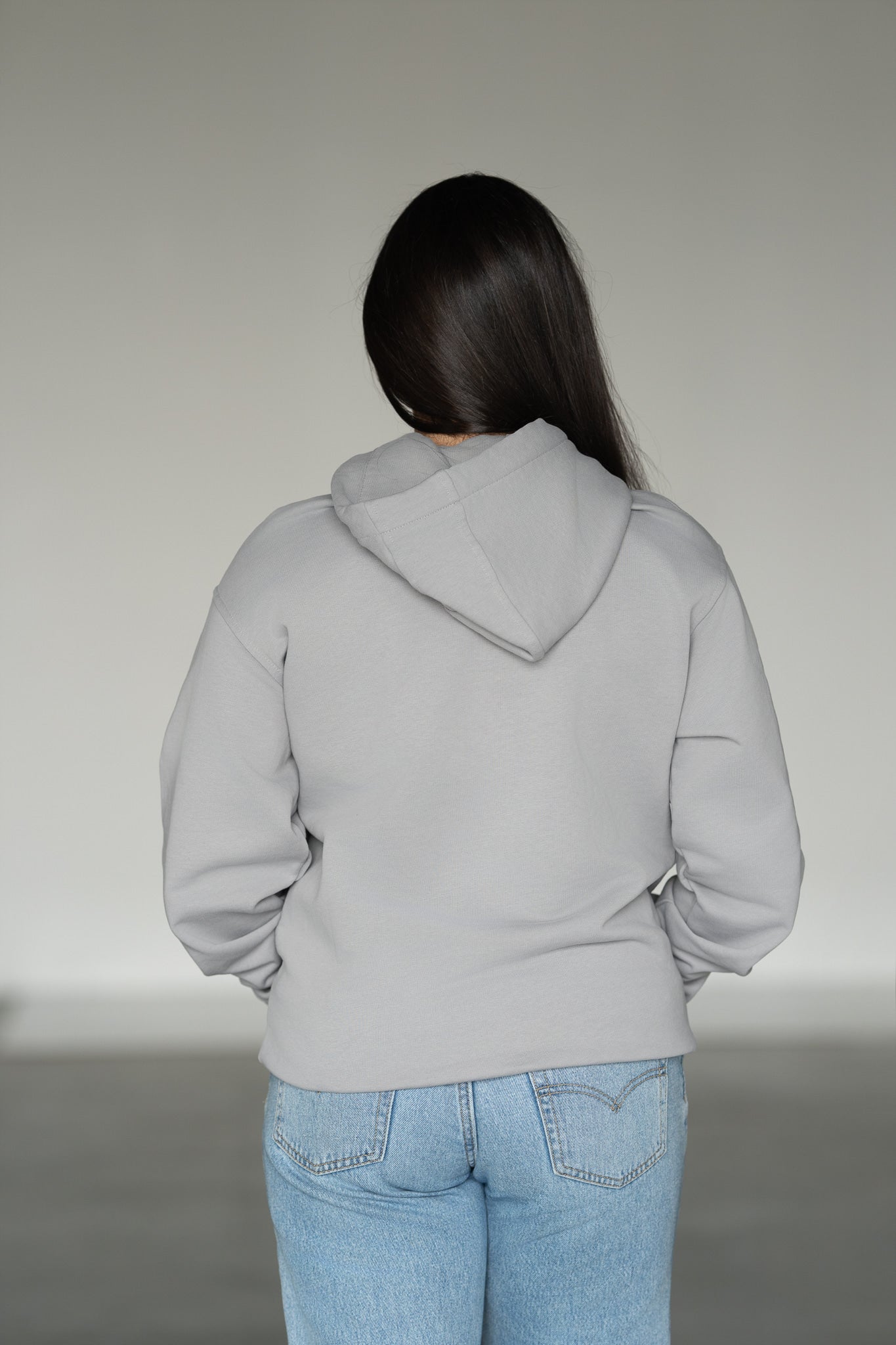 OOsmash women's Essential Hoodie — embroidered logo, kangaroo pocket, cropped relaxed fit, back view