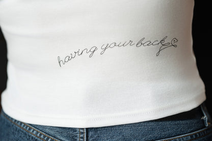 Printed statement on the back- Having your back- Premium Women's Crop Top - OOsmash Streetwear