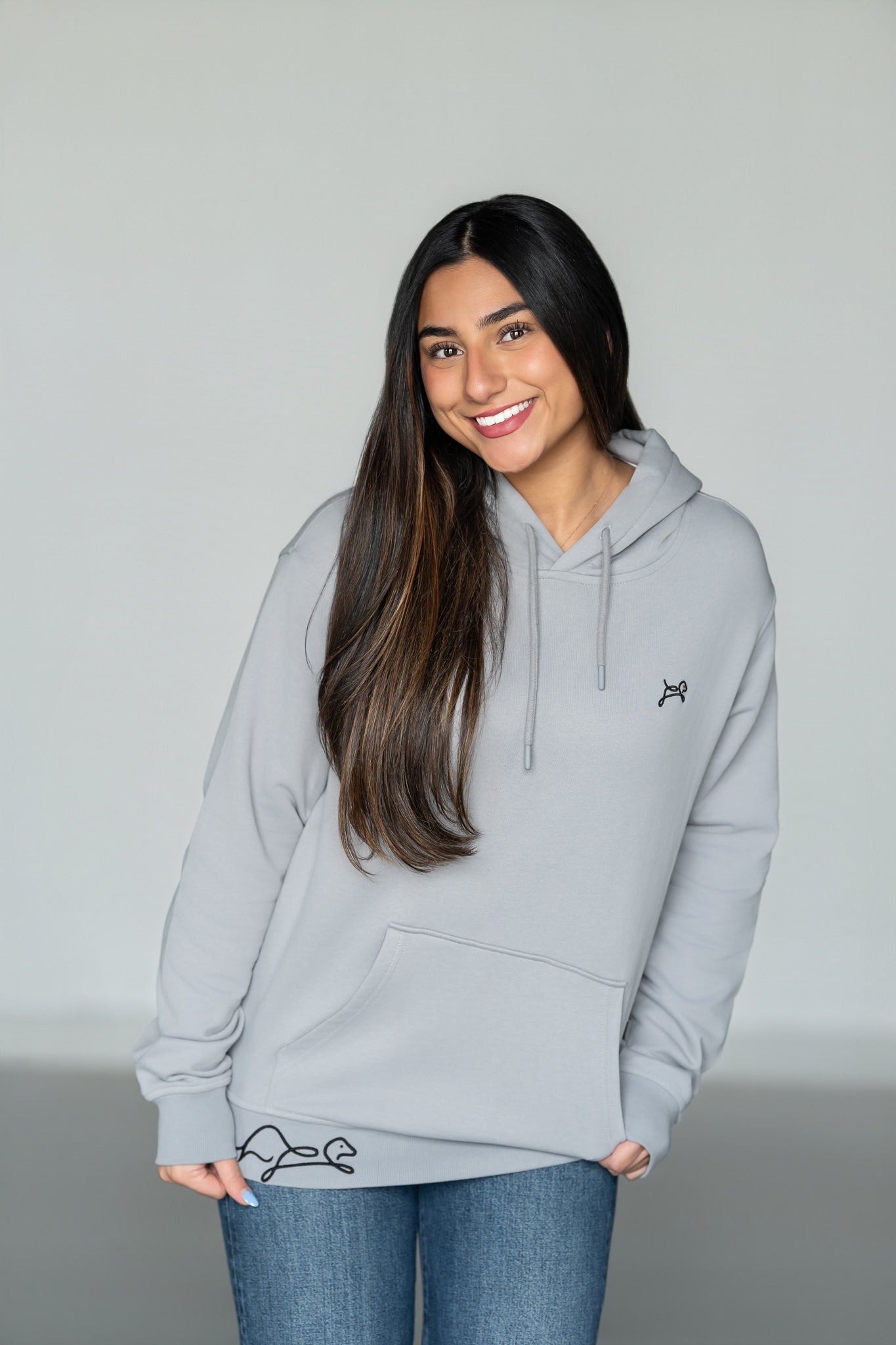 OOsmash Signature Hoodie women's — premium French Terry Cotton, signature hem embroidery, drawstring hood, front view
