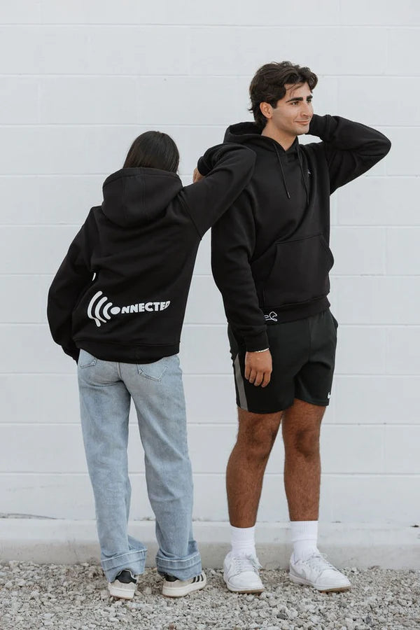 Two models wearing black OOsmash hoodies