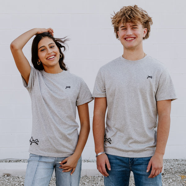 Models wearing OOsmash women’s Heather Gray T-Shirt featuring clean stitching and flattering fit.