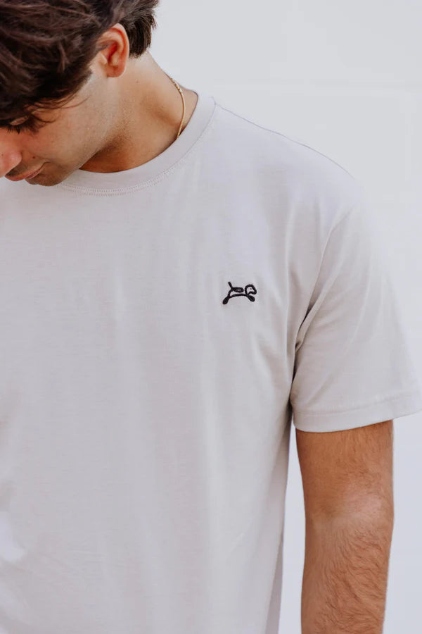 Model wearing beige men's OOsmash T-Shirt