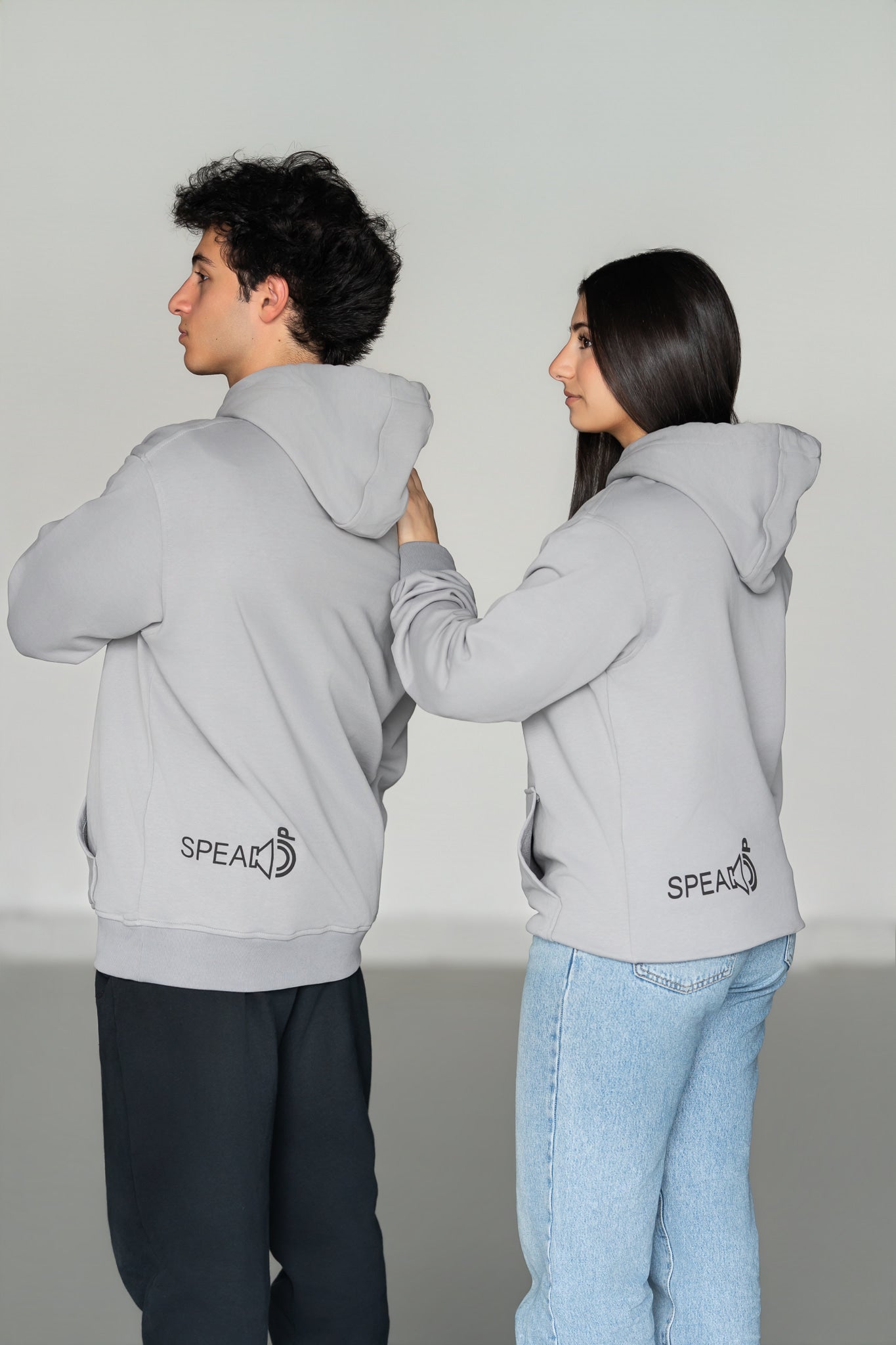 OOsmash Speak Up Hoodie — man and woman wearing matching Speak Up hoodie side view, men's luxury streetwear hoodie, gift for him
