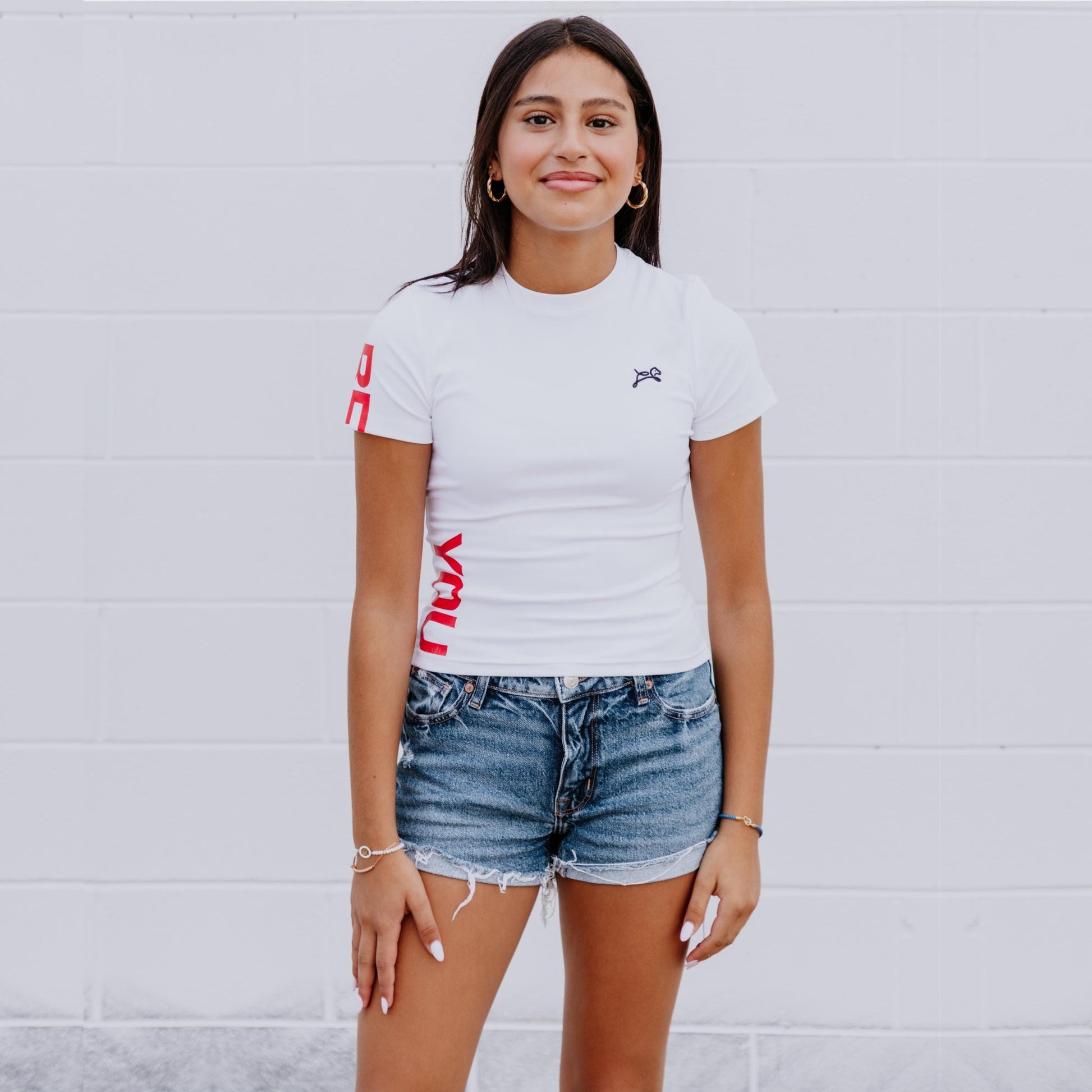 Front view of OOsmash white crop tee crafted with premium cotton-spandex blend for comfort and flexibility.
