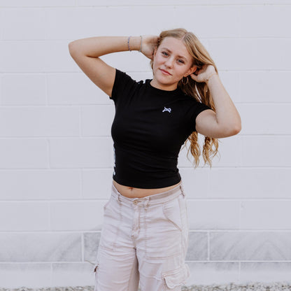 OOsmash black crop tee made from 92% cotton and 8% spandex with soft, flexible fit.