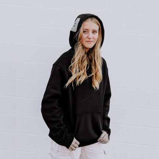 Teen rocking black OOsmash Women  Gray Plug Hoodie—authentic comfort, bold confidence
