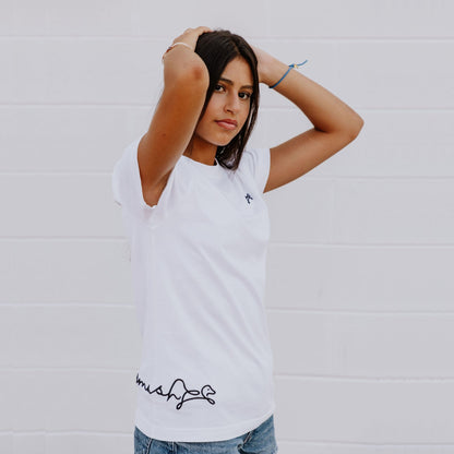 Model wearing OOsmash women’s white T-Shirt featuring clean stitching and flattering fit.