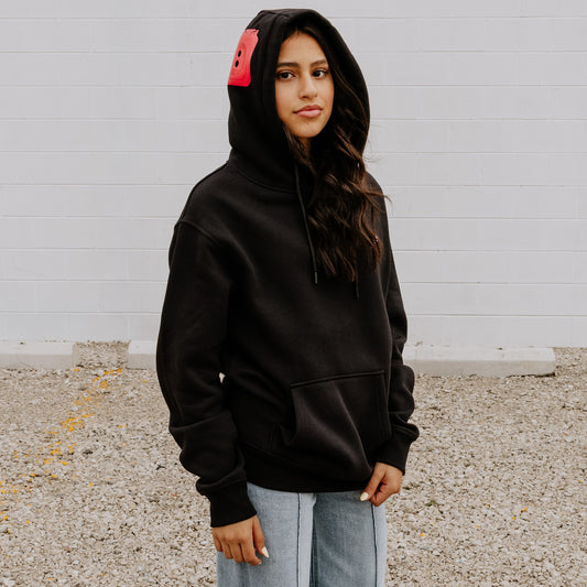 Women's Black OOsmash Plug Hoodie with red European plug design on hood - bold confidence, premium style
